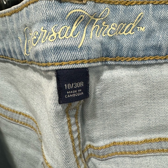 distressed blue jeans - Picture 7 of 8